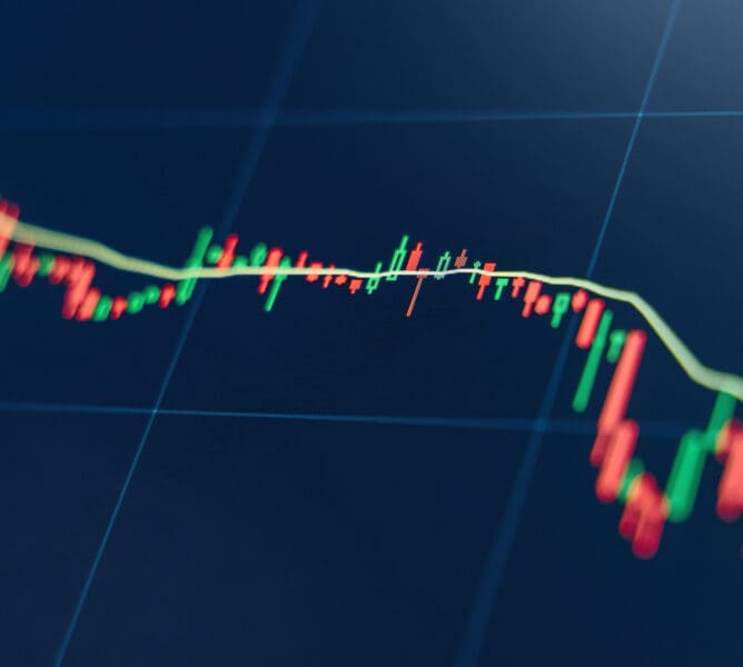 Crypto diagram with green and red candlesticks representing opening and closing on blue display