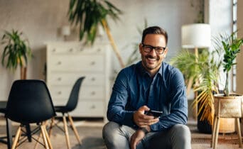 Portrait of a smiling businessman, looking at the camera