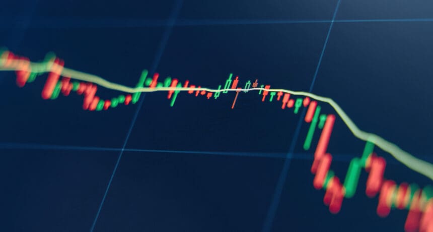 Crypto diagram with green and red candlesticks representing opening and closing on blue display